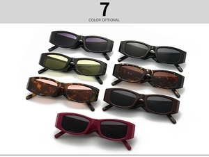 Flat lay of vintage rectangular sunglasses in 7 various colors and tortoiseshell frames