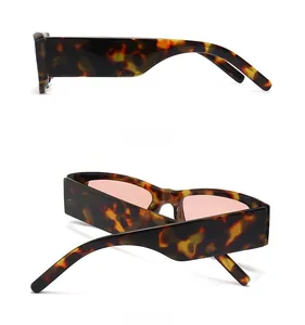 Detailed side and back view of retro tortoiseshell sunglasses with pink lenses