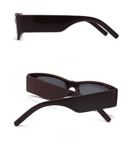 Side and back views of dark red rectangular sunglasses in polished finish resin
