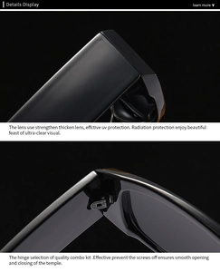 Macro display of black slim sunglasses featuring thick lenses and durable metal hinges