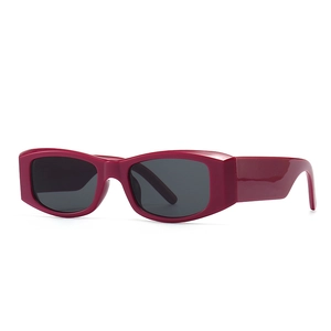 Retro Y2K red rectangular chunky frame sunglasses with dark lenses for a modern street look
