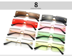 Close-up of narrow rimless rectangle sunglasses in 8 vibrant colors with rhinestone accents