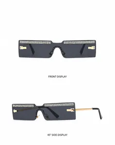 Front and side view of rimless rectangular sunglasses with gold black frame and rhinestones