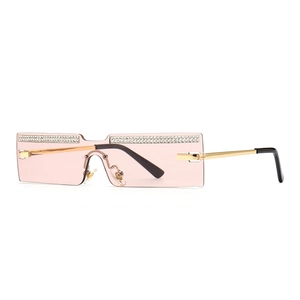 Modern rimless rectangular sunglasses with pink lenses and rhinestone embellishments