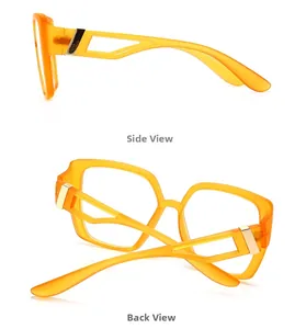 Detail view of orange geometric cat-eye frame with hollowed temples and gold metal accents