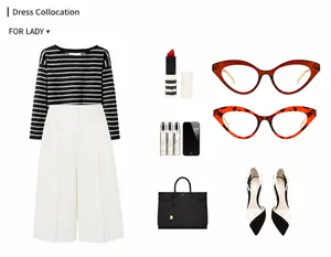 Flat lay di occhiali cat-eye con outfit retrò e accessori alla moda per signora