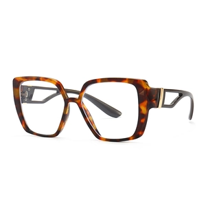 Modern tortoiseshell cat-eye computer glasses with retro hollow metal temple accents