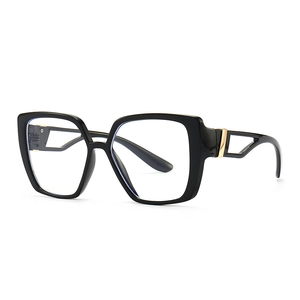 Modern cat-eye blue light blocking glasses in black with gold metal hollowed-out temples