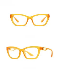 Detail view of orange rectangular glasses with stylish cutout metal temples and clear frames
