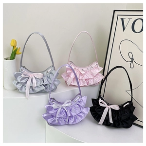 Satin tote bags featuring layered ruffles and bows in four vibrant colors for women