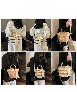 Detail of woven straw bucket bag with lace bow ribbon and striped pattern texture