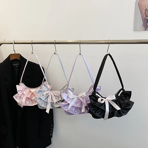 Pleated satin tote bag with ruffles and bow in pink, silver, purple, and black colors