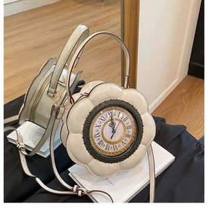 Detail of flower-shaped clock bag with roman numerals and lychee pattern leather