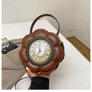 Close-up of vintage brown leather flower bag with clock dial and roman numerals