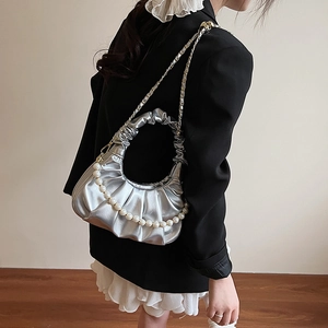 Silver pleated cloud shoulder bag with pearl chain strap and metallic finish