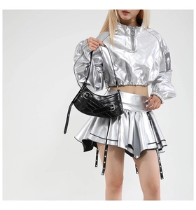 Y2K style glossy black crescent shoulder bag with metallic silver outfit details