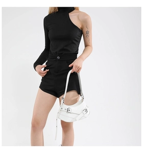 Close-up of a white leather crossbody bag featuring silver buckles and modern techwear style