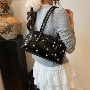 Large black patent leather shoulder bag with silver star sun and pearl decorations