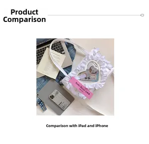 White heart-shaped window ita bag size comparison with an iPad and a smartphone
