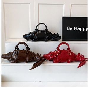 Detailed comparison of 3D crocodile-shaped handbags in black, dark brown, and red colors
