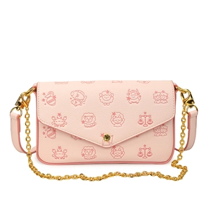 Pink chain crossbody bag with zodiac cartoon print and gold hardware on white background
