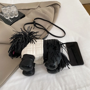 Creative dog shaped crossbody bag with black fringe and white quilted leather detail