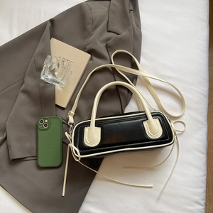 French style contrast color baguette bag in black and white with a chic shoulder strap