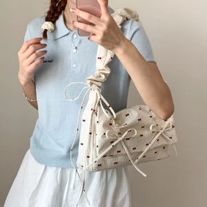 Chic pleated underarm bag in cream white with red bow prints and trendy ruched strap