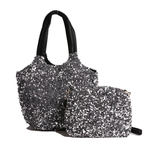 Ensemble sac seau à paillettes argentées avec anses en cuir noir et pochette assortie