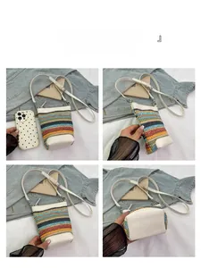 Detail view of multi-color knitted crossbody phone bag with white leather straps