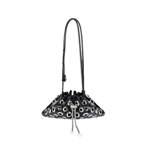 Punk style black leather bucket bag with silver eyelets and pearl drawstring detail