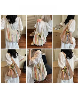 Detail view of woven hobo bag with colorful tassels and a spacious crochet design