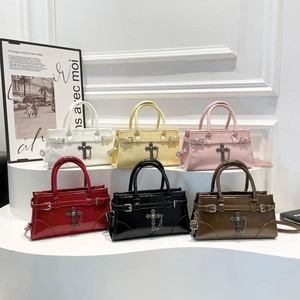 Retro Boston bags in six vibrant colors with metallic cross charms and glossy finish