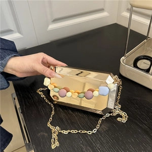 Golden geometric octagonal evening bag with colorful beads and metal chain strap