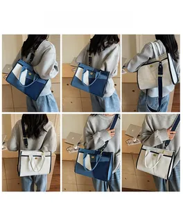Vielseitige Patchwork-Tragetasche aus Denim als Handtasche und Umhängetasche getragen