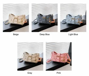 Detailansicht der Vintage-Achseltaschen in Beige, Dunkelblau, Hellblau, Grau und Rosa Tönen