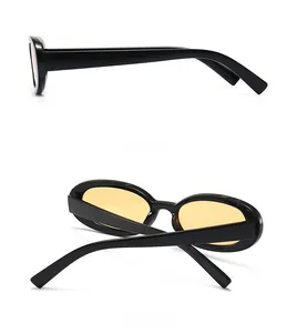 Detailed side and back view of retro small frame sunglasses with yellow lenses