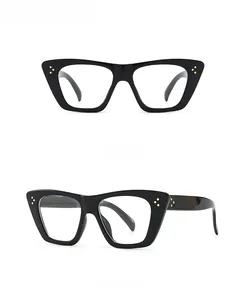 Detailed front and side views of black cat-eye frames with golden rivet studs