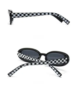 Detailed side and back view of oval sunglasses with black and white checkered temples