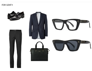 Flat lay of navy pinstripe suit with business accessories and rivet sunglasses