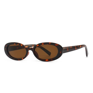 Retro small oval frame sunglasses with vintage tortoiseshell leopard print pattern