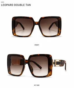 Details einer quadratischen Sonnenbrille mit Leopardenmuster und goldfarbenen Bügeln