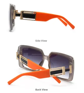 Detailansicht der orange-goldenen Kontrastbügel dieser eckigen Rock-Sonnenbrille
