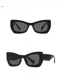 Front and side view of modern butterfly cat-eye sunglasses with thick black frames