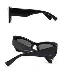 Detailed side and back view of glossy black butterfly sunglasses with wide temples
