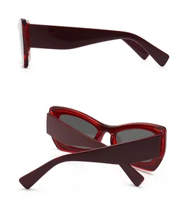 Side and rear view of dark red butterfly sunglasses with thick temples on white background