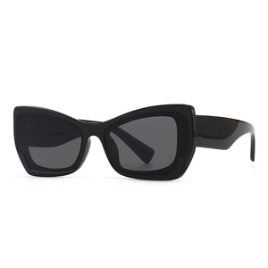 Modern oversized black butterfly cat-eye sunglasses for women in a vintage chic style