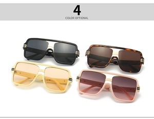 Macro view of oversized retro square sunglasses showing four color options with gold accents
