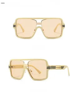 Detailed views of yellow oversized square sunglasses with gold metal hinge accents