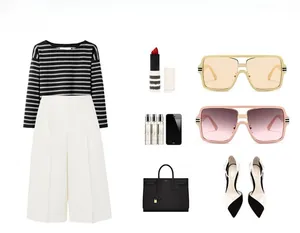 Flat lay of retro square sunglasses paired with striped top, trousers, and accessories